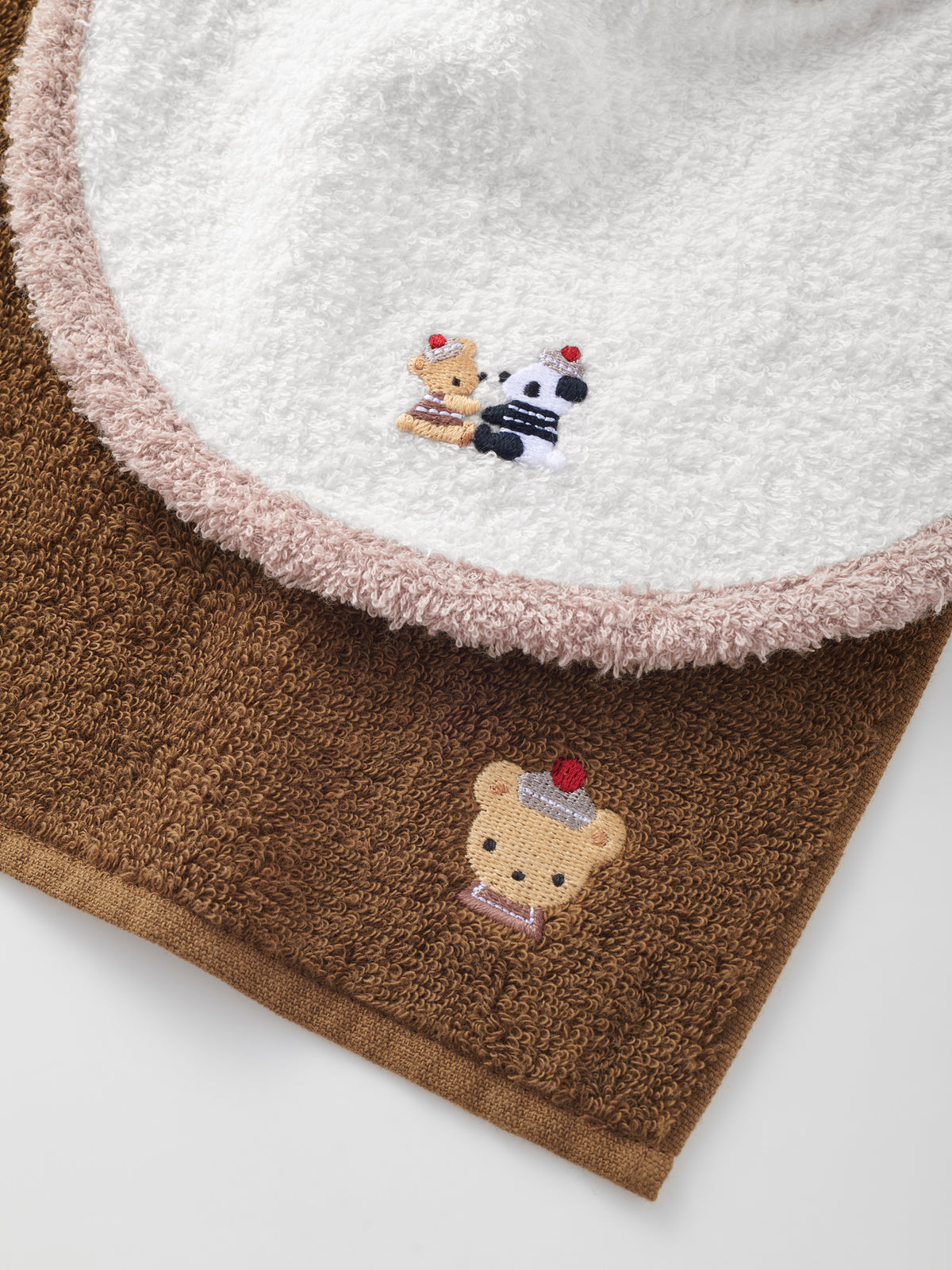 Set of bib, mascot and towel handkerchief