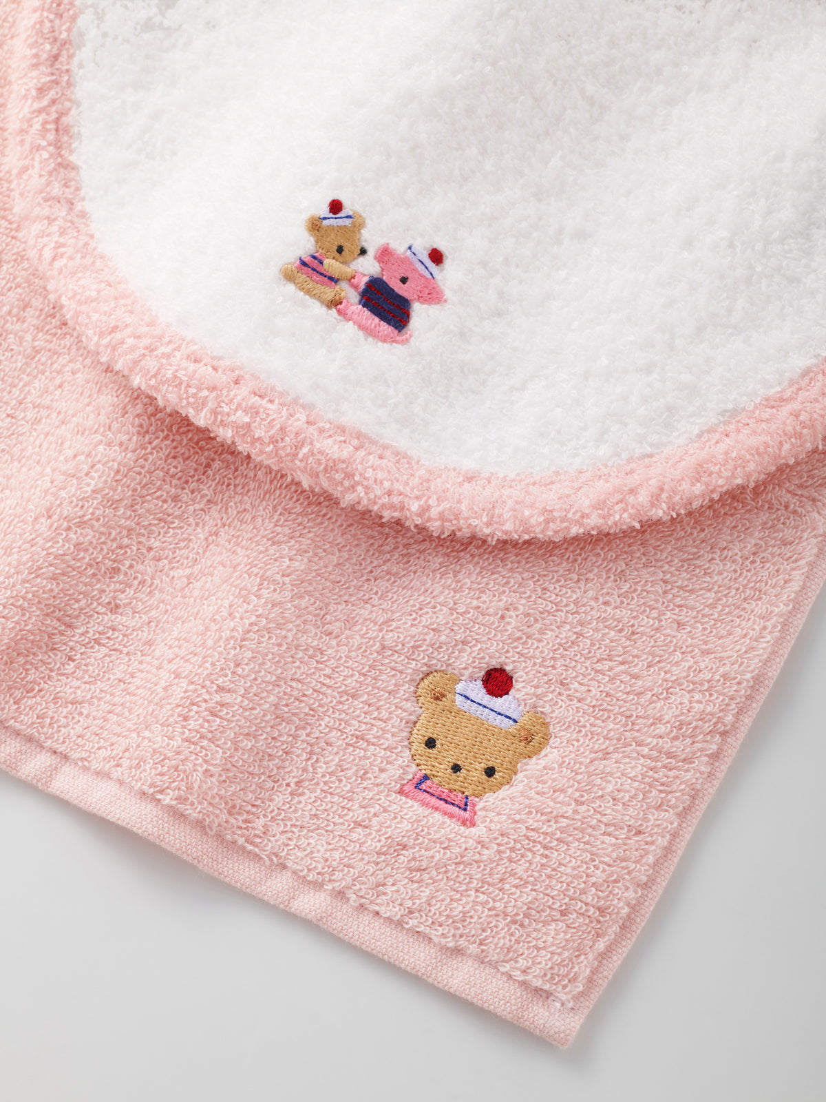 Set of bib, mascot and towel handkerchief