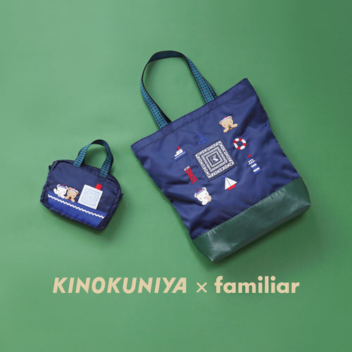 Two bags with colorful designs on a green background.