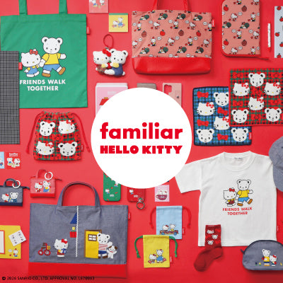 Collection of Hello Kitty merchandise on a red background.