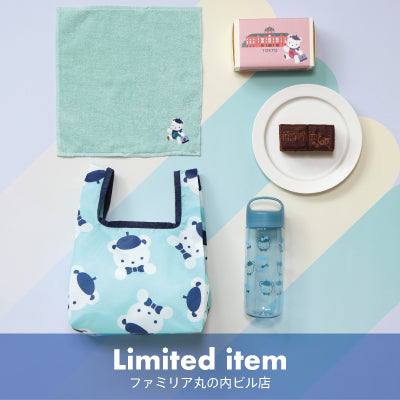 A limited item display including a bag, towel, bottle, and snack.